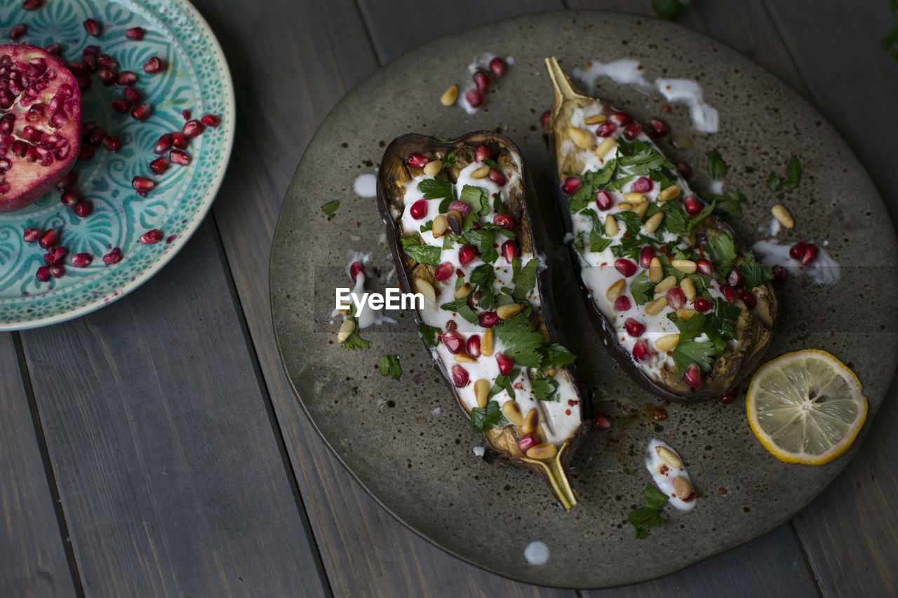 Delicious baked eggplant served on plate