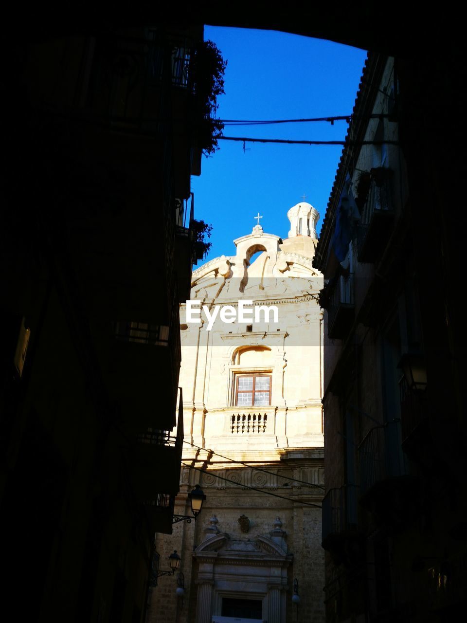 Low angle view of buildings against clear sky