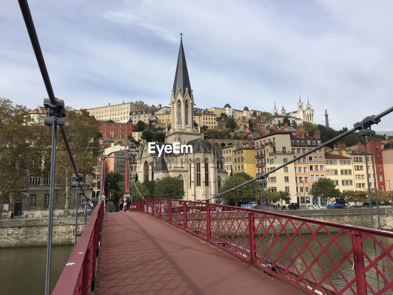 The saint-georges roman catholic church seen from the paul couturier bridge in lyon, france.