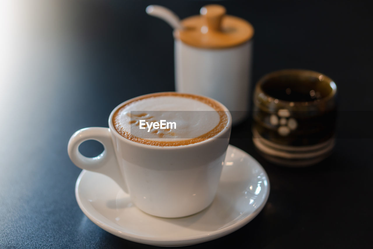 Close-up of coffee cup on table