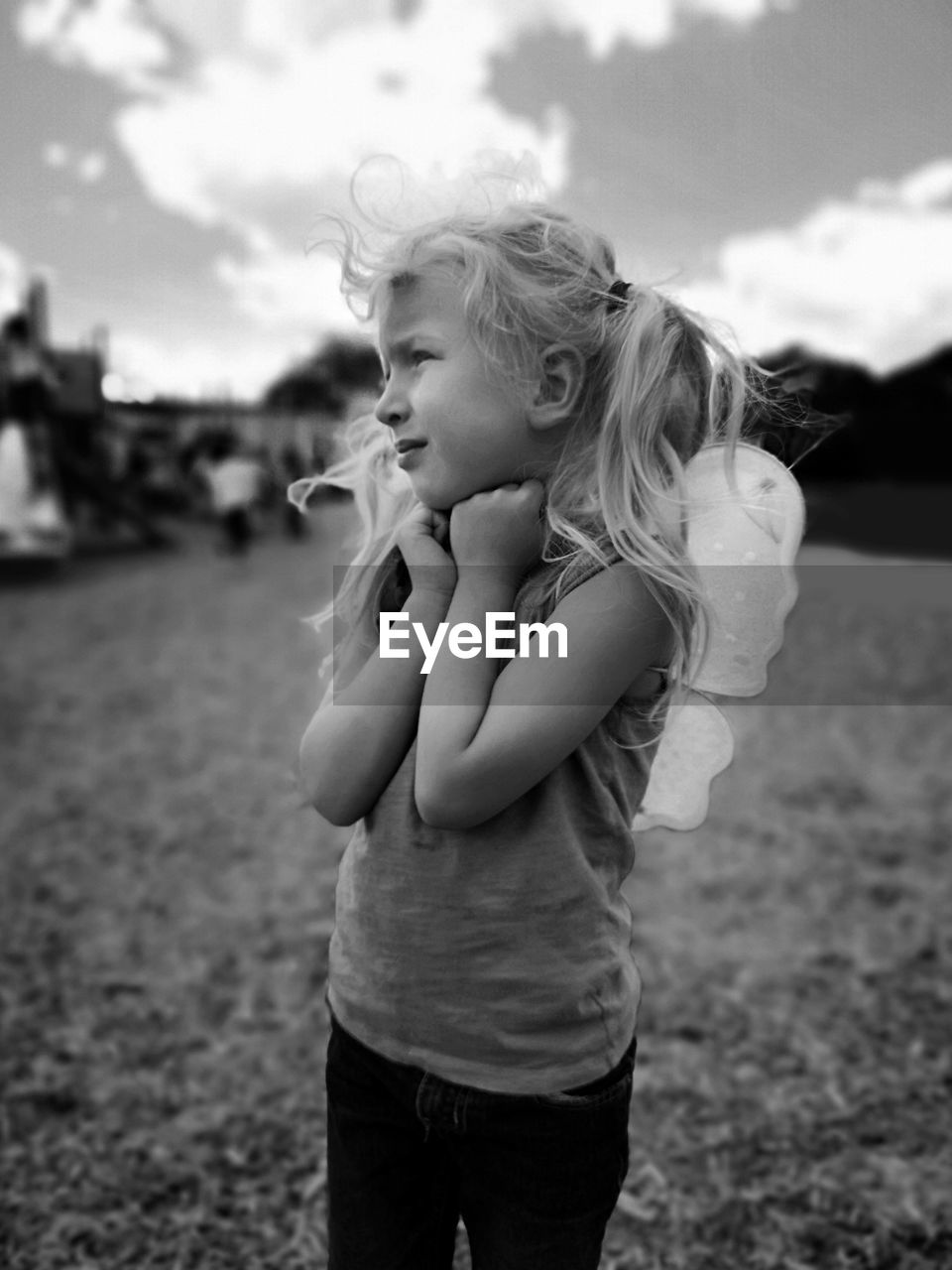 Girl standing on field