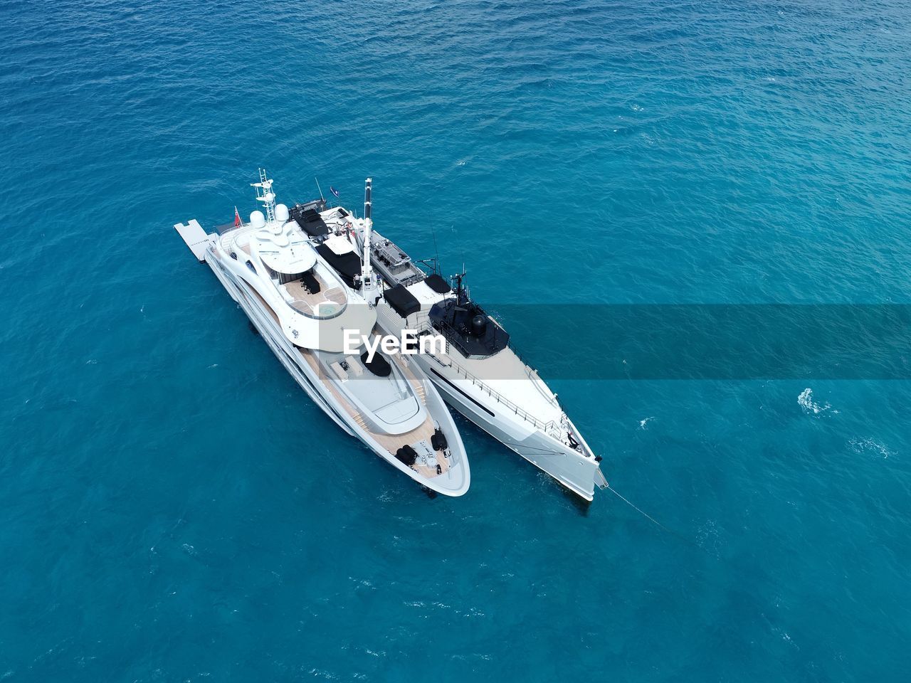 HIGH ANGLE VIEW OF SHIP ON SEA