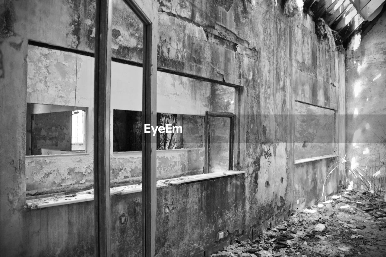 BROKEN WINDOW OF OLD BUILDING