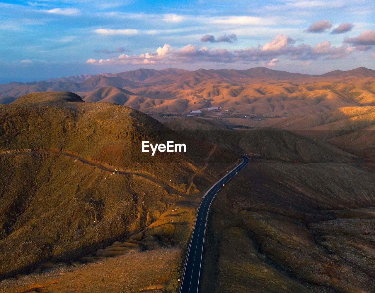 High angle view of road amidst landscape against sky