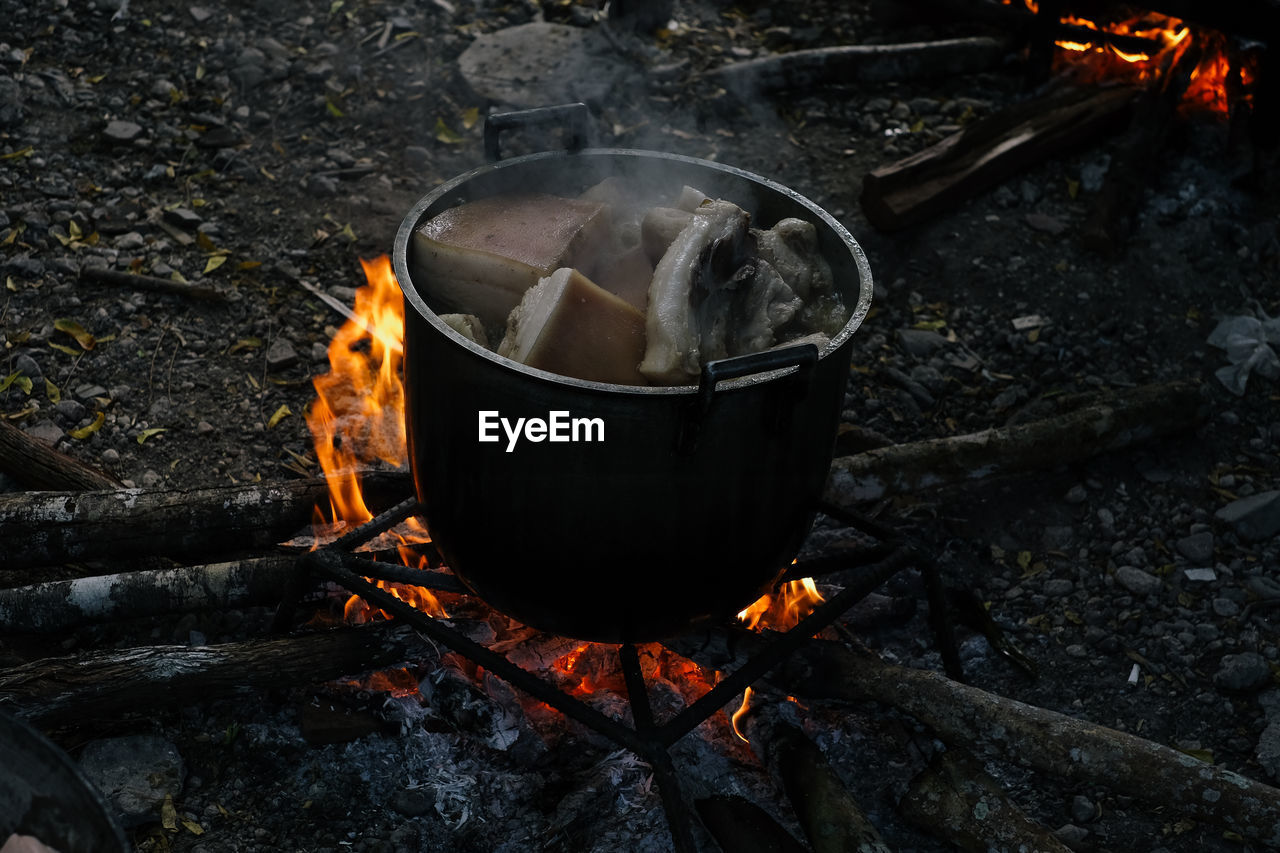 Close-up of food on campfire