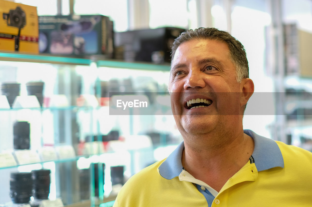 Close-up of smiling man indoor