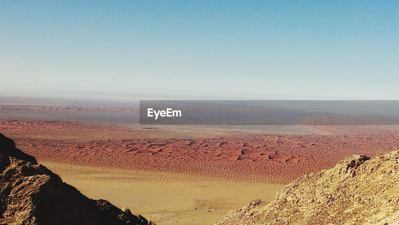 High angle view of desert landscape against sky