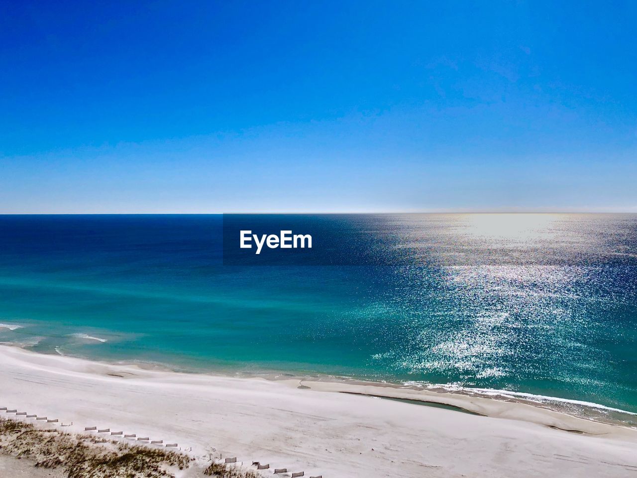 SCENIC VIEW OF SEA AGAINST BLUE SKY