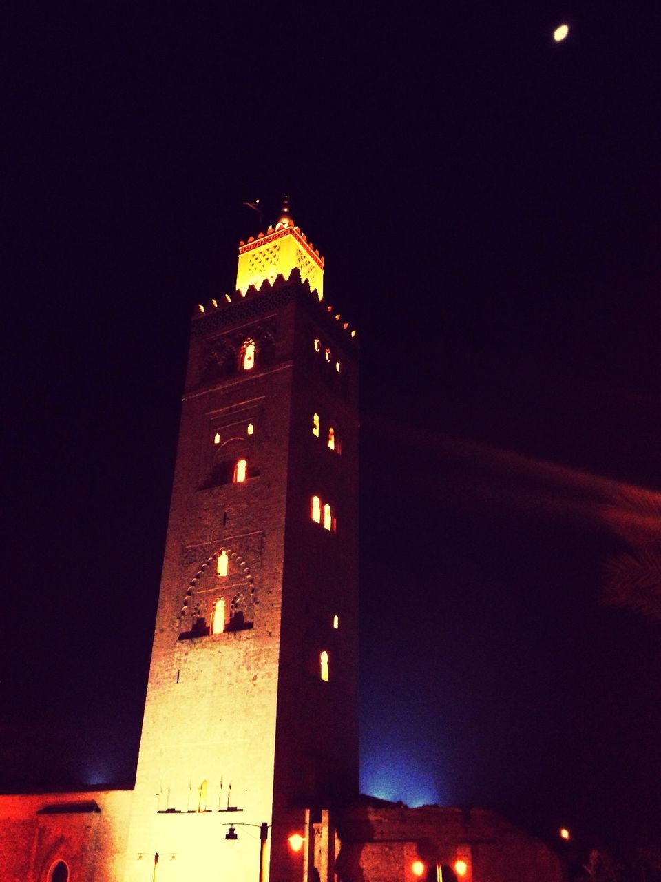 LOW ANGLE VIEW OF ILLUMINATED BUILDINGS