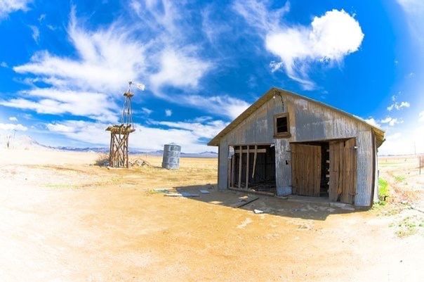 BUILT STRUCTURES AGAINST CLOUDY SKY