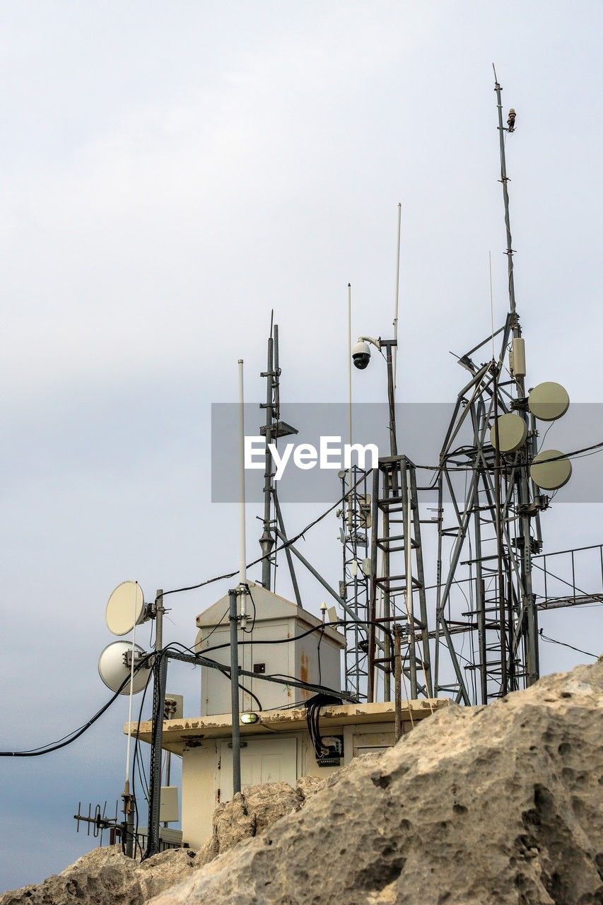 Kemer, turkey - november 30, 2022. rocky hilltop telecommunications equipment.