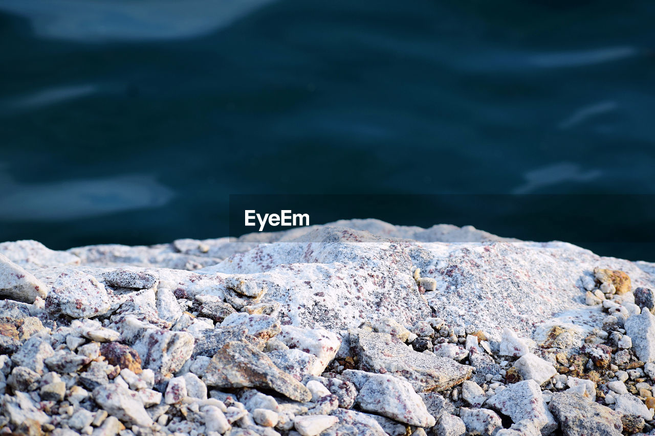 sea, water, rock, ocean, nature, wave, shore, coast, no people, beach, beauty in nature, day, land, tranquility, outdoors, scenics - nature, environment, ice, tranquil scene