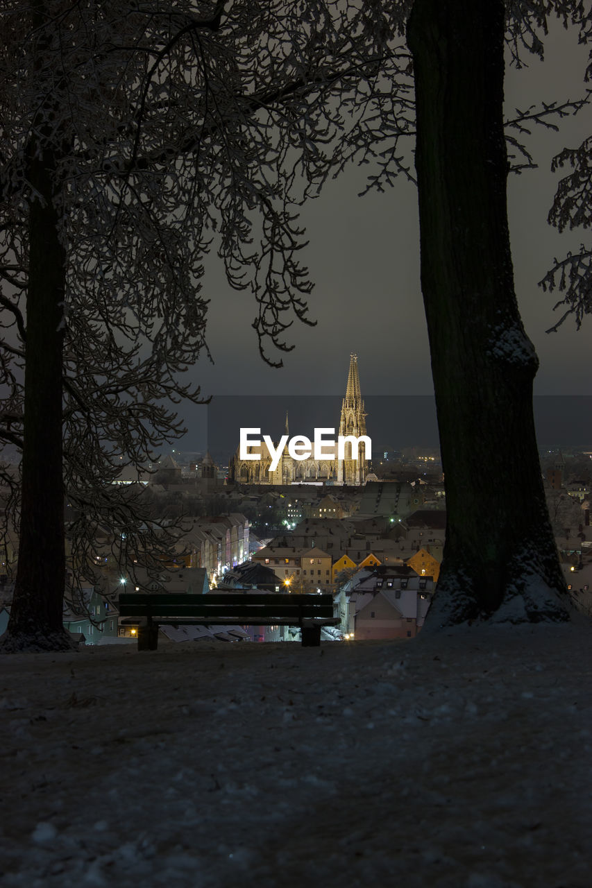 Cathedral against sky in city at night during winter