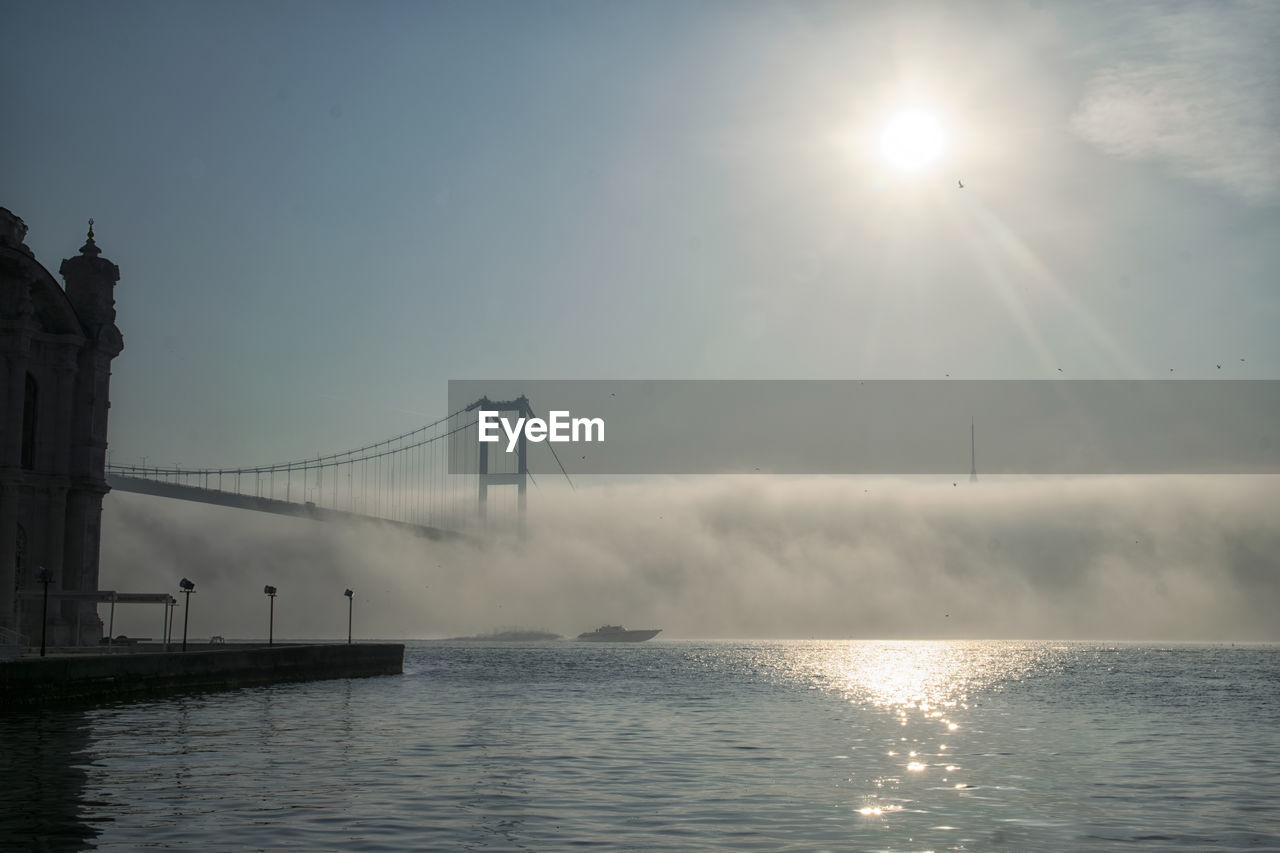 Speed boat and 15 july martyrs in foggy morning istanbul turkey 