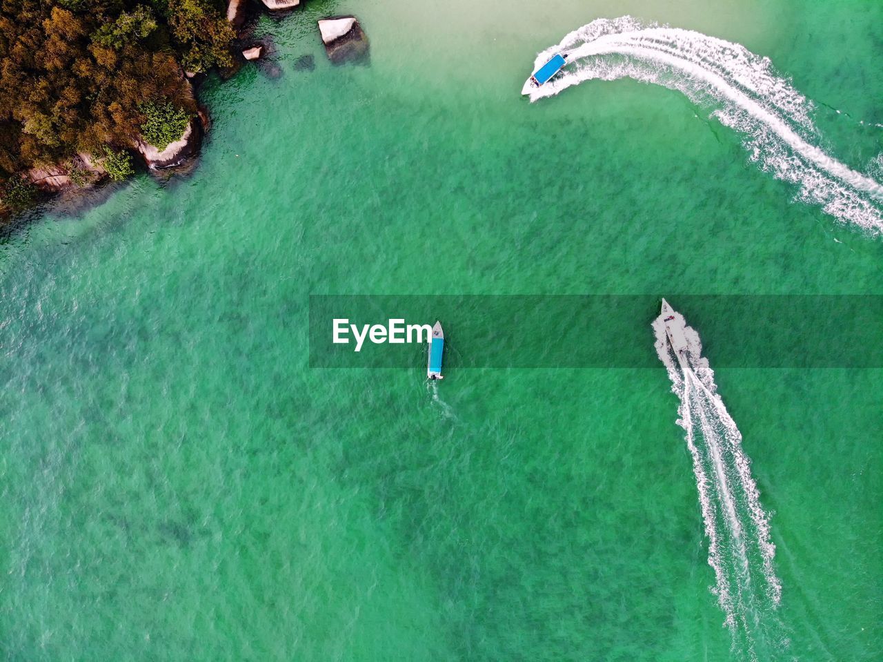 Aerial view of motorboats in sea