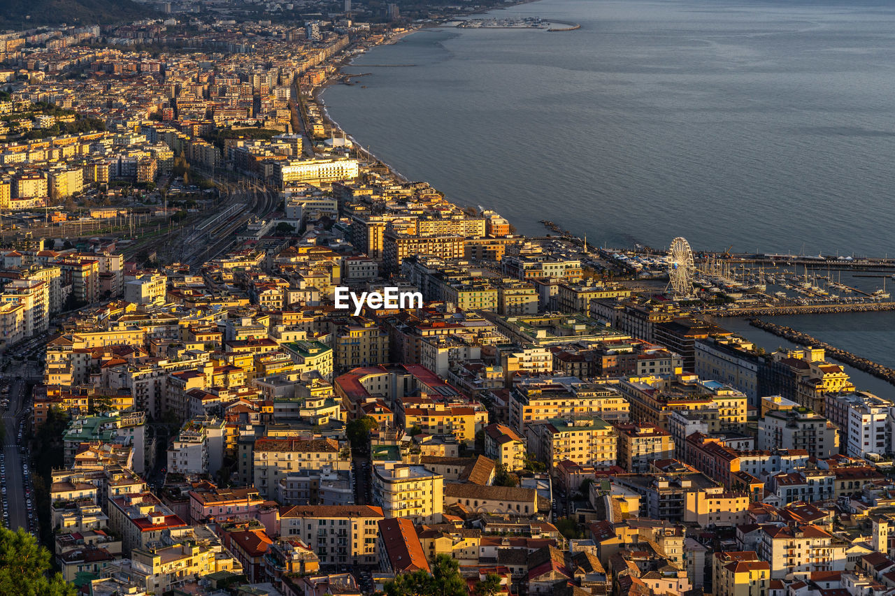 Aerial view of salerno historic center at sunset from the arechi castle, campania, italy