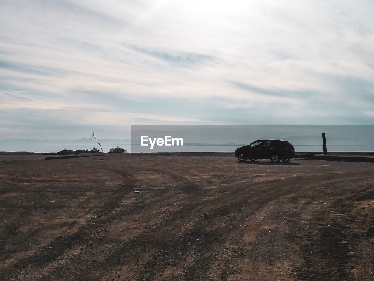 SCENIC VIEW OF LAND AGAINST SEA