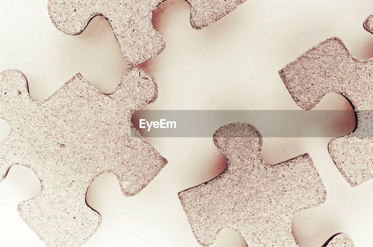 High angle view of jigsaw pieces on table