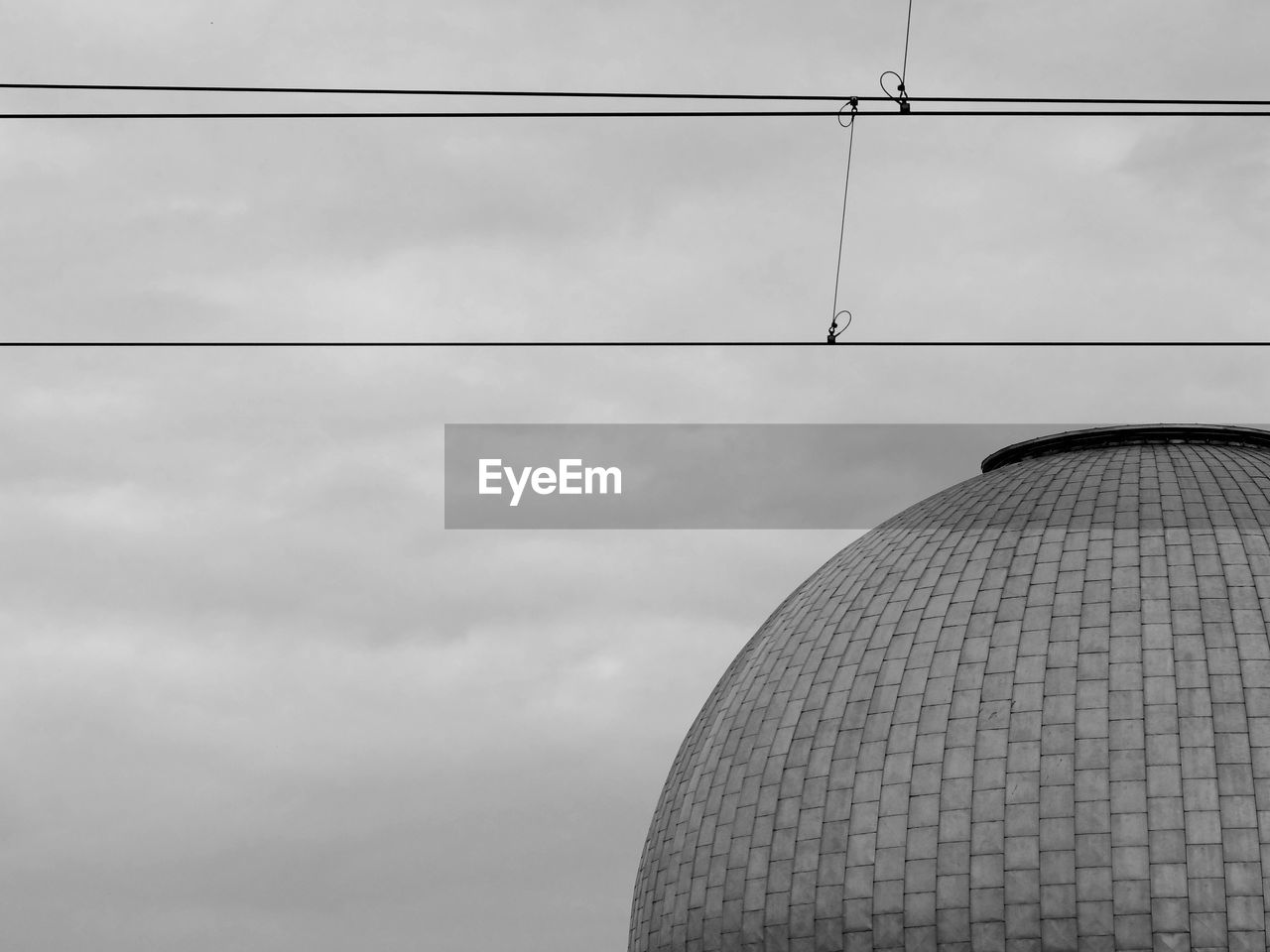 LOW ANGLE VIEW OF CABLES AGAINST SKY