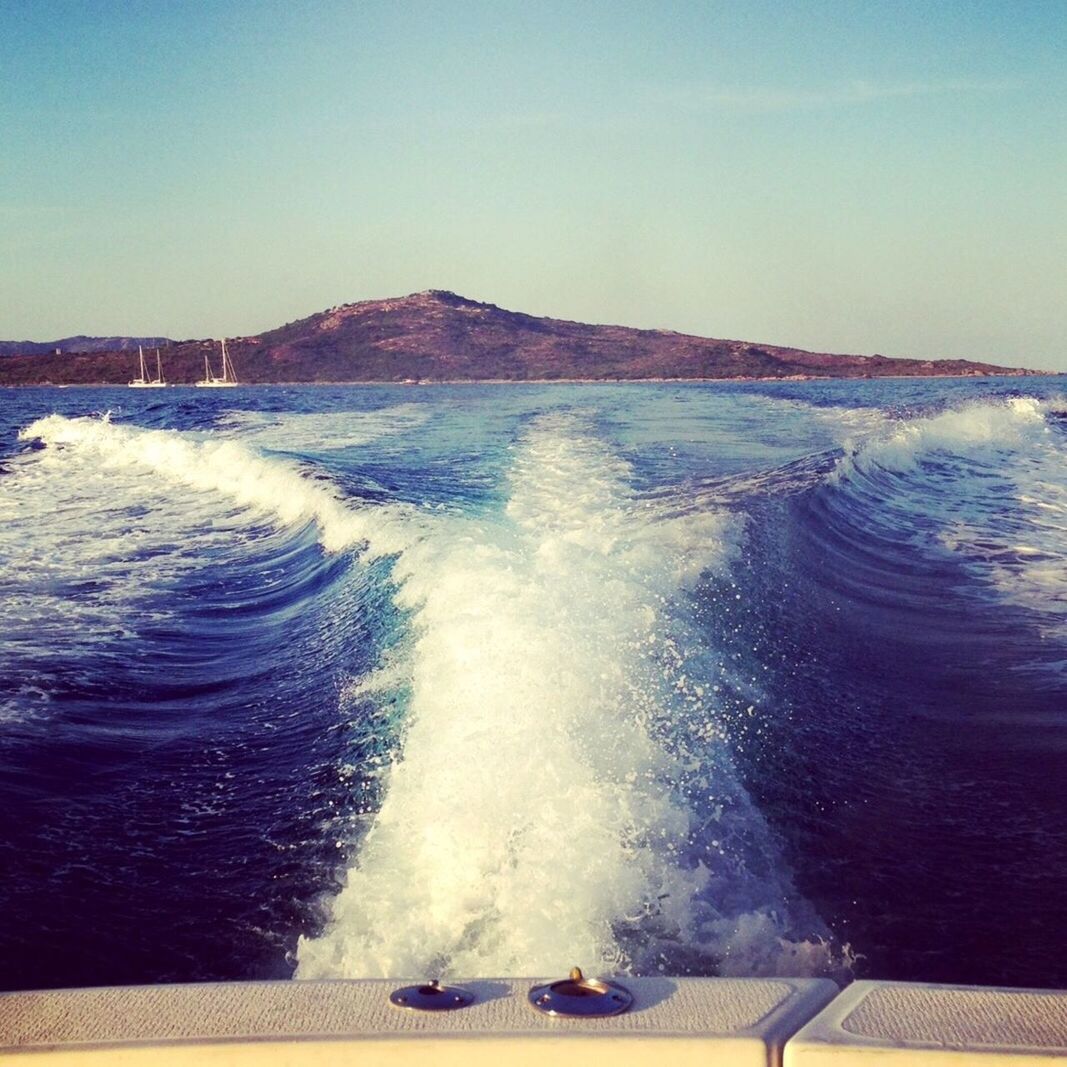 View of coastline from motorboat