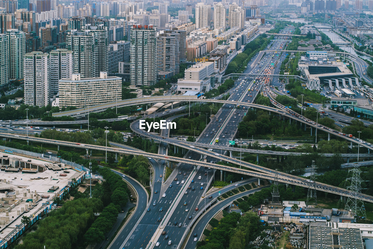 HIGH ANGLE VIEW OF CITY STREET AND MODERN BUILDINGS