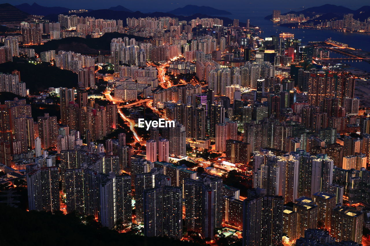 Aerial view of illuminated cityscape at night