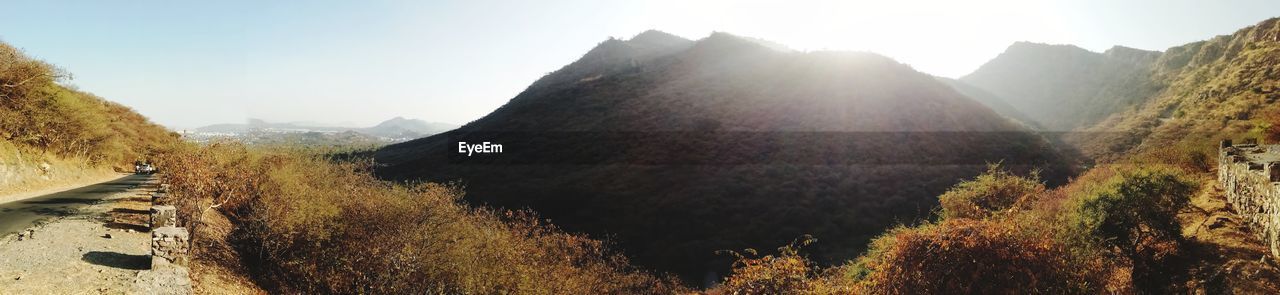 PANORAMIC SHOT OF MOUNTAINS AGAINST SKY