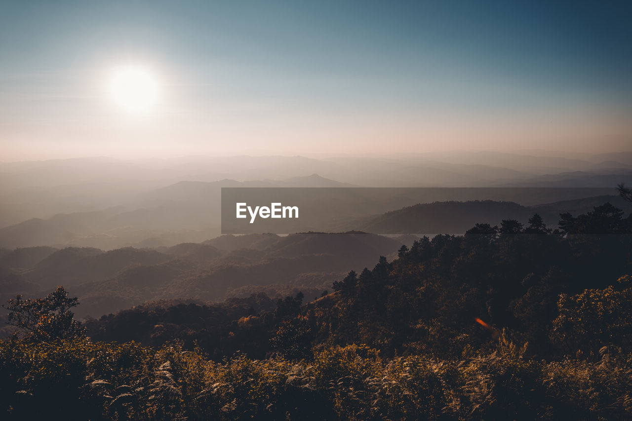 Scenic view of mountains against sky during sunset