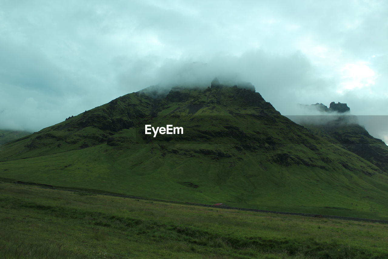 SCENIC VIEW OF MOUNTAIN AGAINST SKY