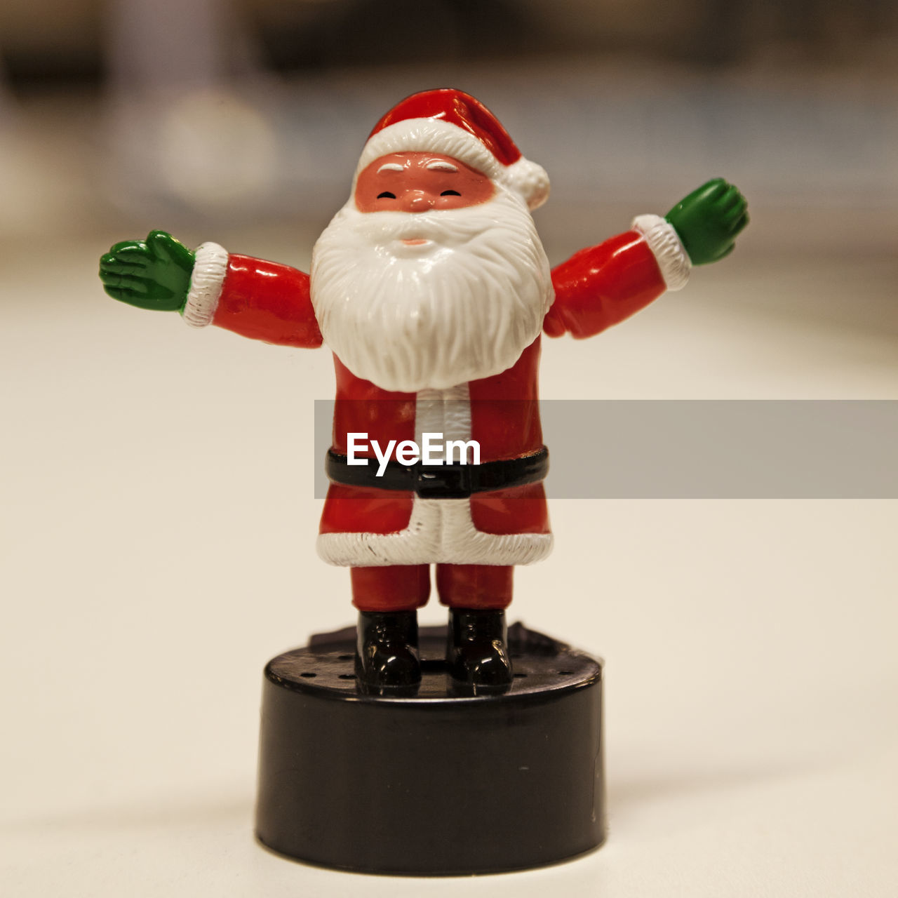 Cute and happy little santa with outstretched arms