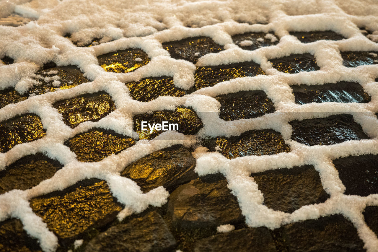 High angle view of snow on rocks