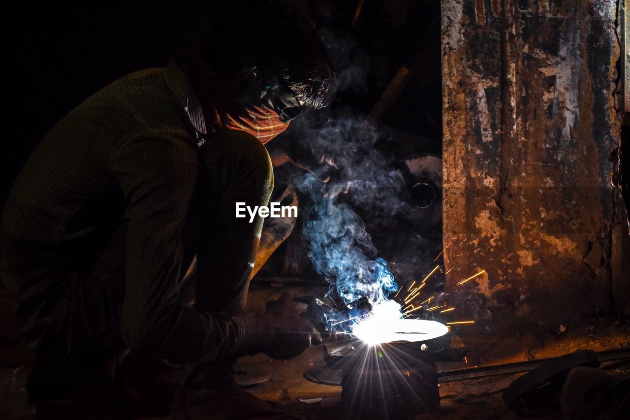 Man welding in factory