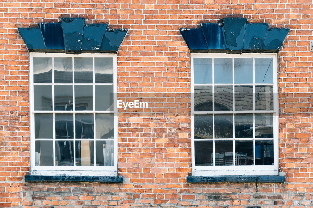 Closed windows of old building