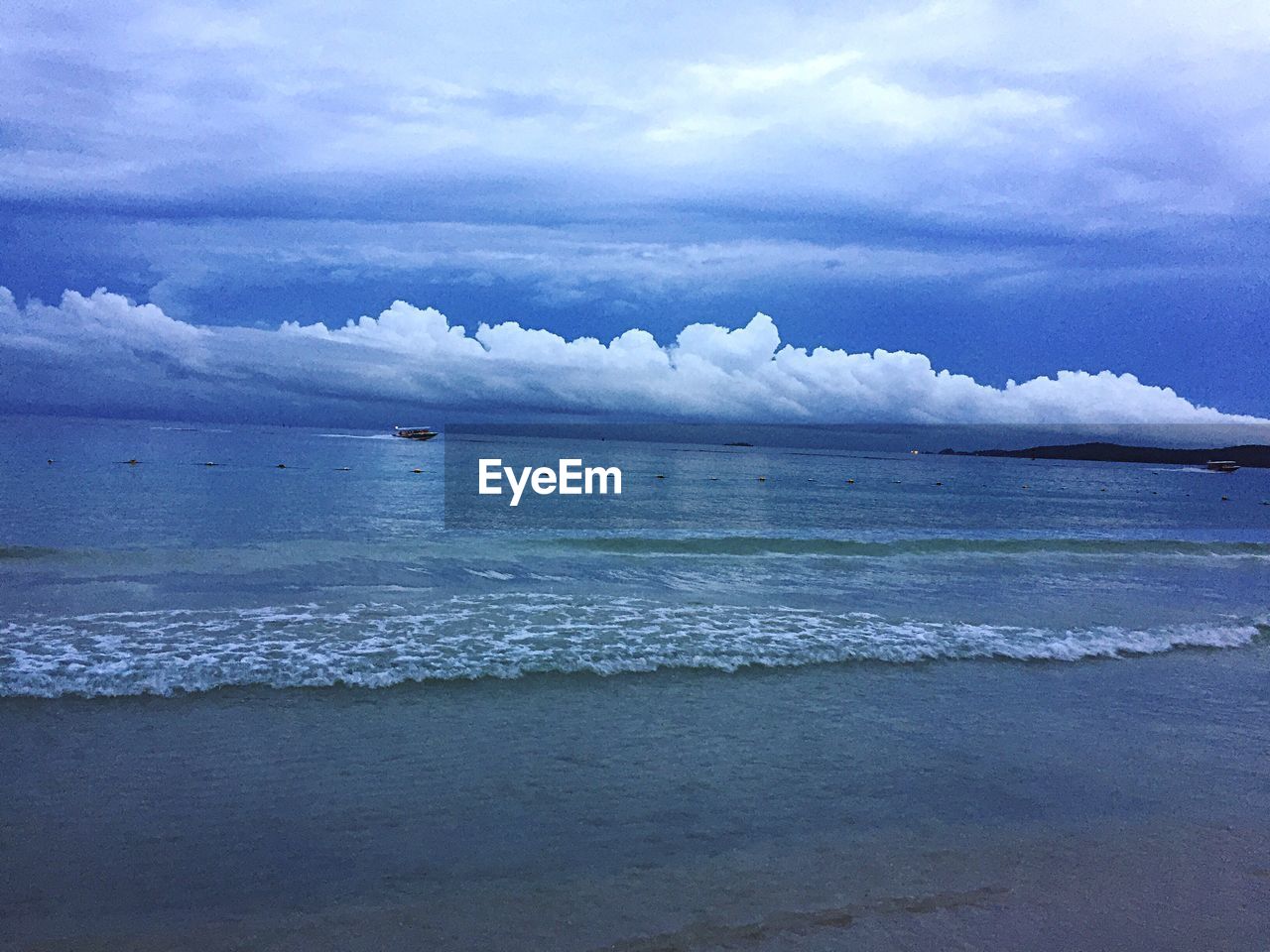 View of sea against cloudy sky