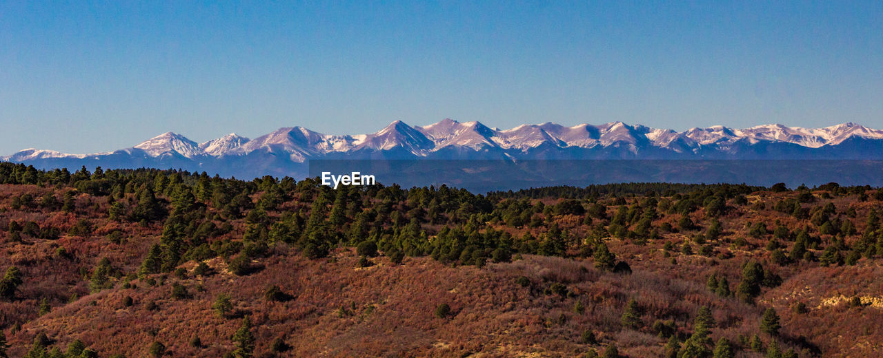 Scenic view of mountains against clear sky