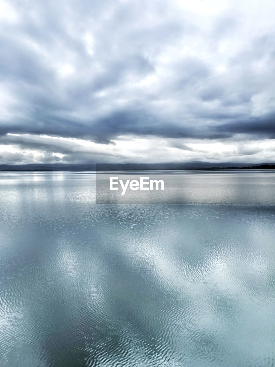 REFLECTION OF CLOUDS IN SEA