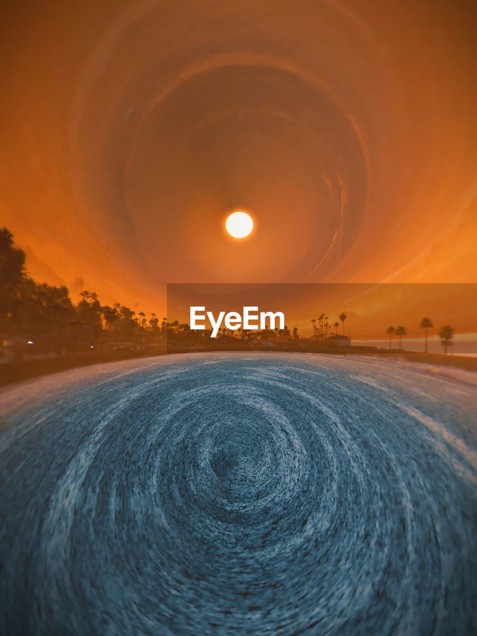 sky, horizon, circle, geometric shape, wave, nature, beauty in nature, sunset, scenics - nature, sunlight, landscape, environment, sun, shape, land, space, no people, water, astronomical object, tranquility, dawn, orange color, cloud, astronomy, outdoors, sea, dramatic sky, motion, tranquil scene, evening, moon, reflection, ocean, idyllic