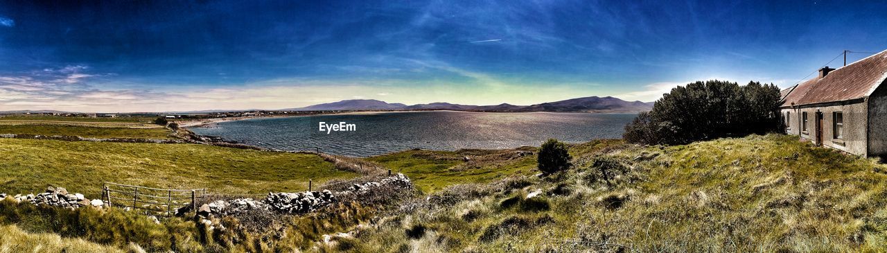 Panoramic scenic view of sea against sky. county kerry ireland.