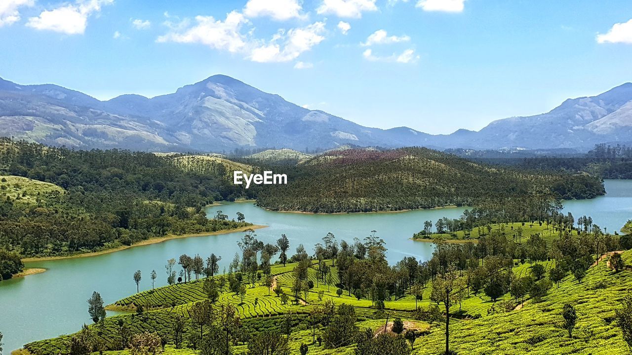 SCENIC VIEW OF LAKE AGAINST MOUNTAINS