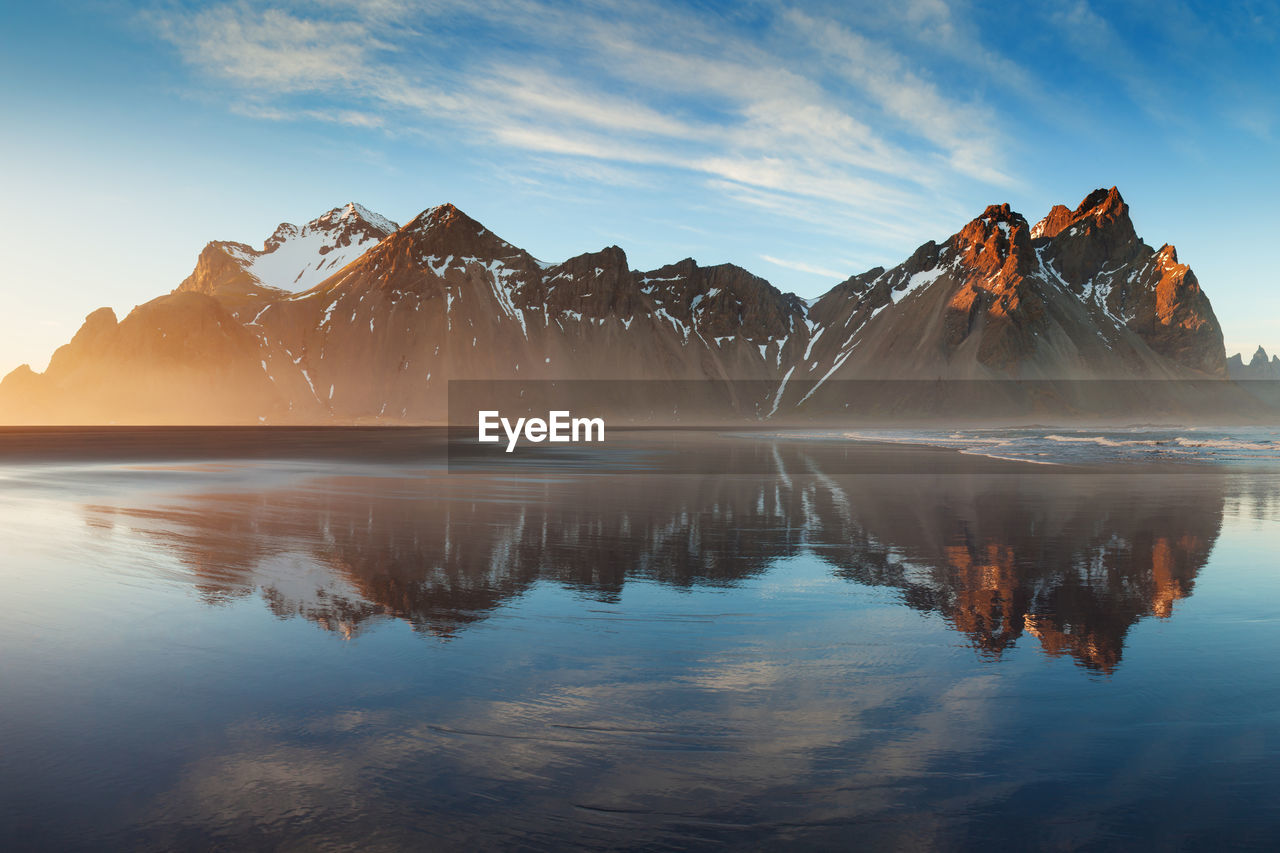 SCENIC VIEW OF LAKE AGAINST SKY DURING WINTER