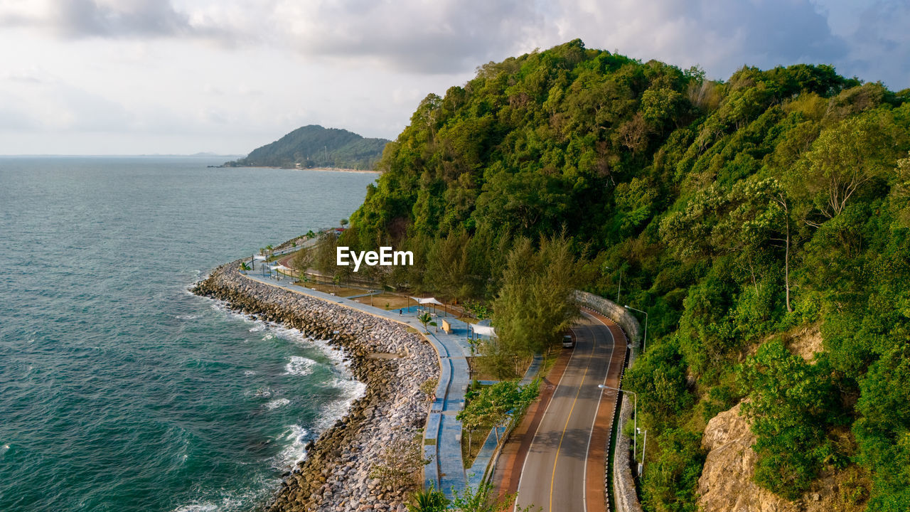 high angle view of road by sea against sky