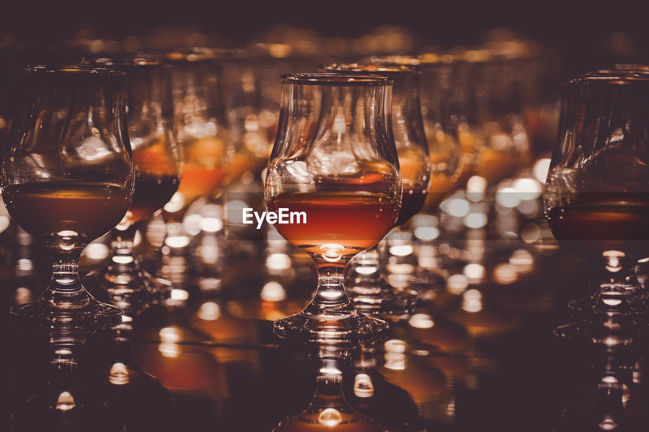 close-up of wineglasses on table