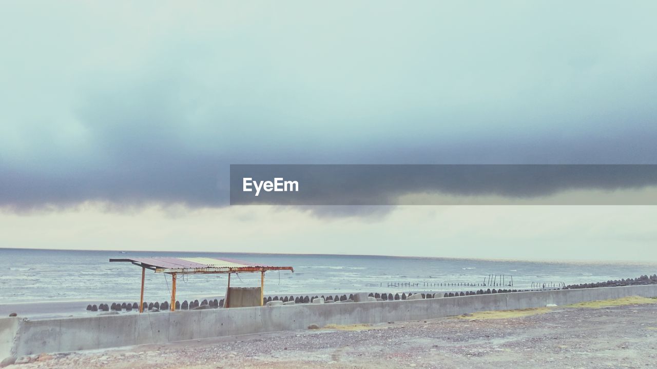 SCENIC VIEW OF BEACH AND SEA AGAINST SKY