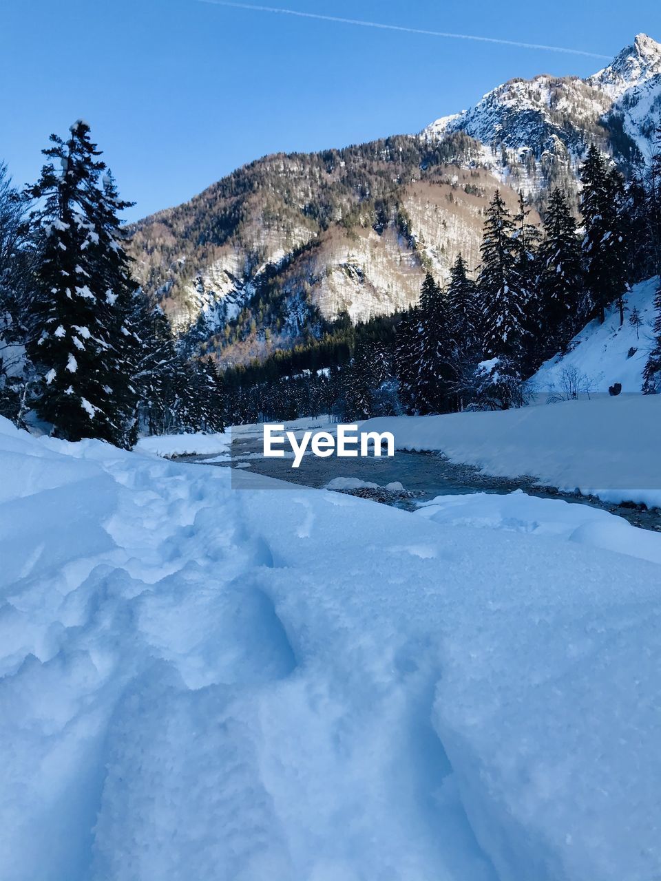 Snow covered mountain against sky