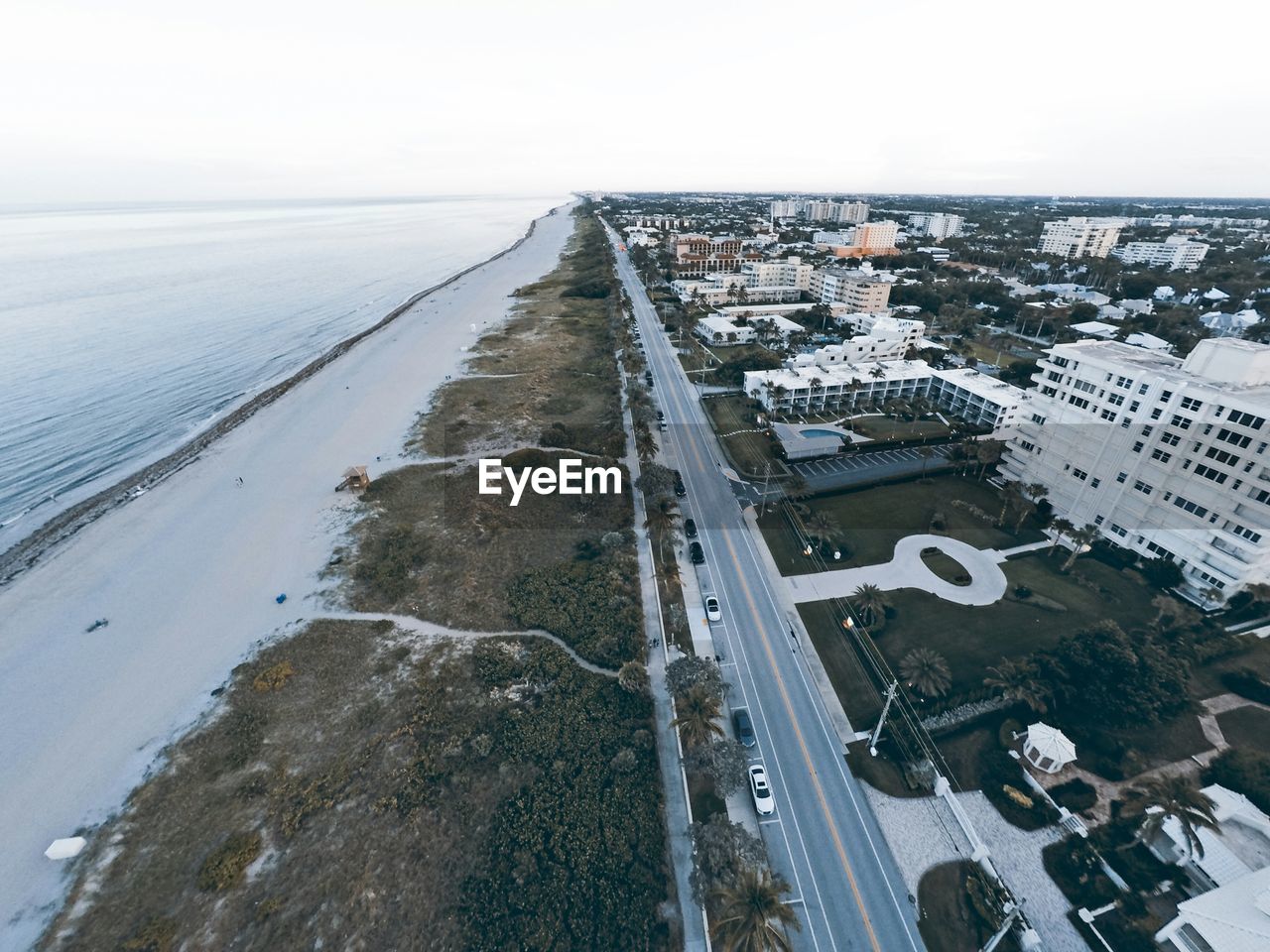 High angle view of city by sea