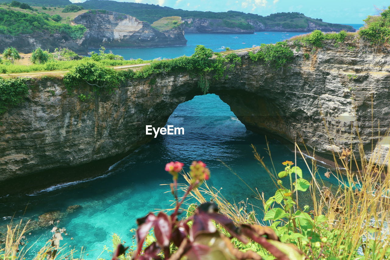 HIGH ANGLE VIEW OF SEA AND ROCK FORMATION