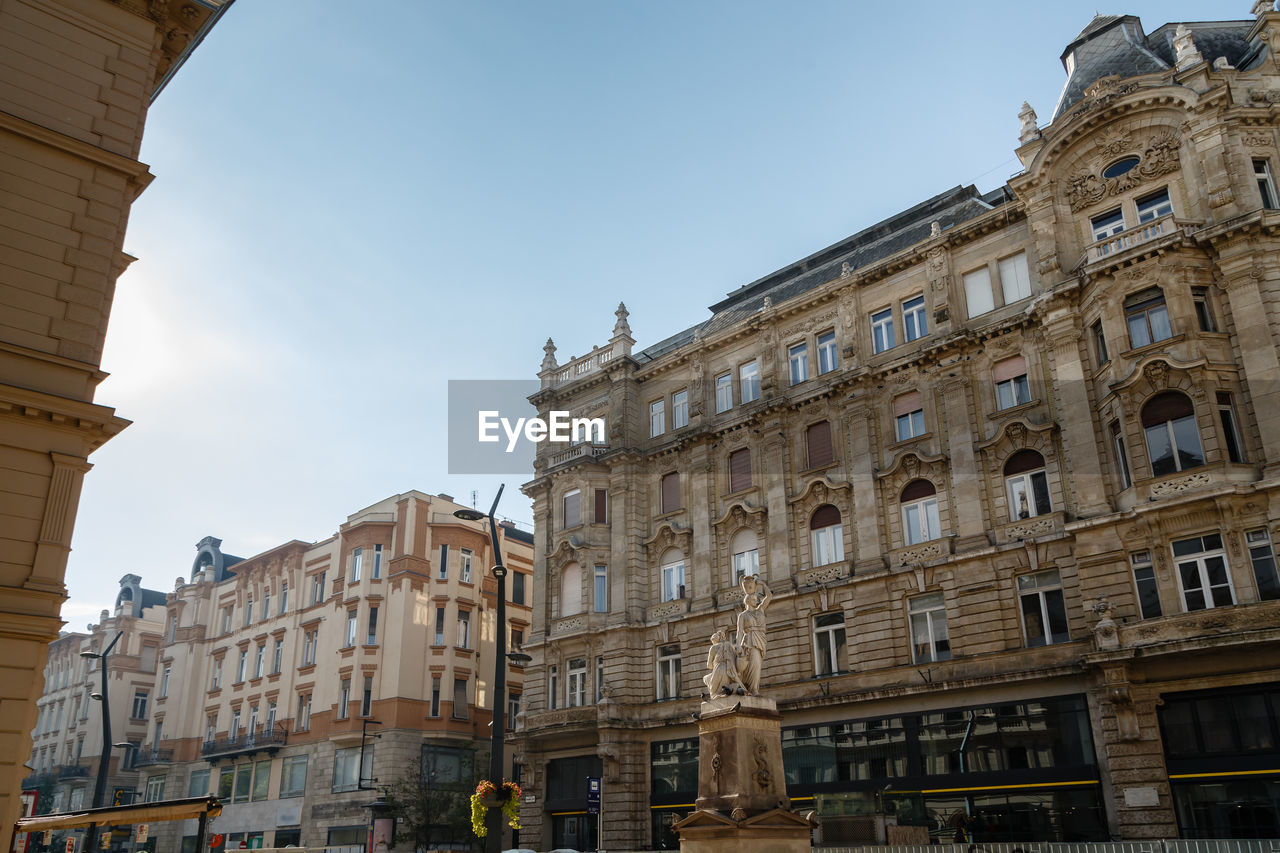 Low angle view of buildings against sky