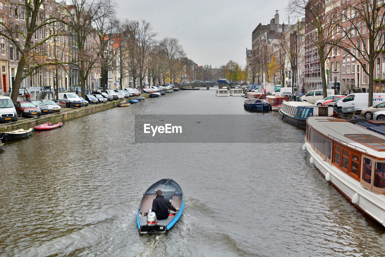 VIEW OF BOATS IN CANAL