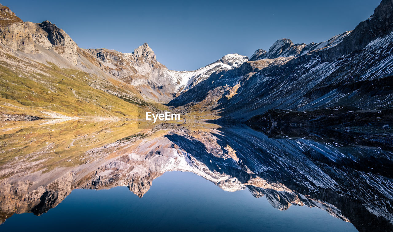 Scenic view of mountains against clear sky