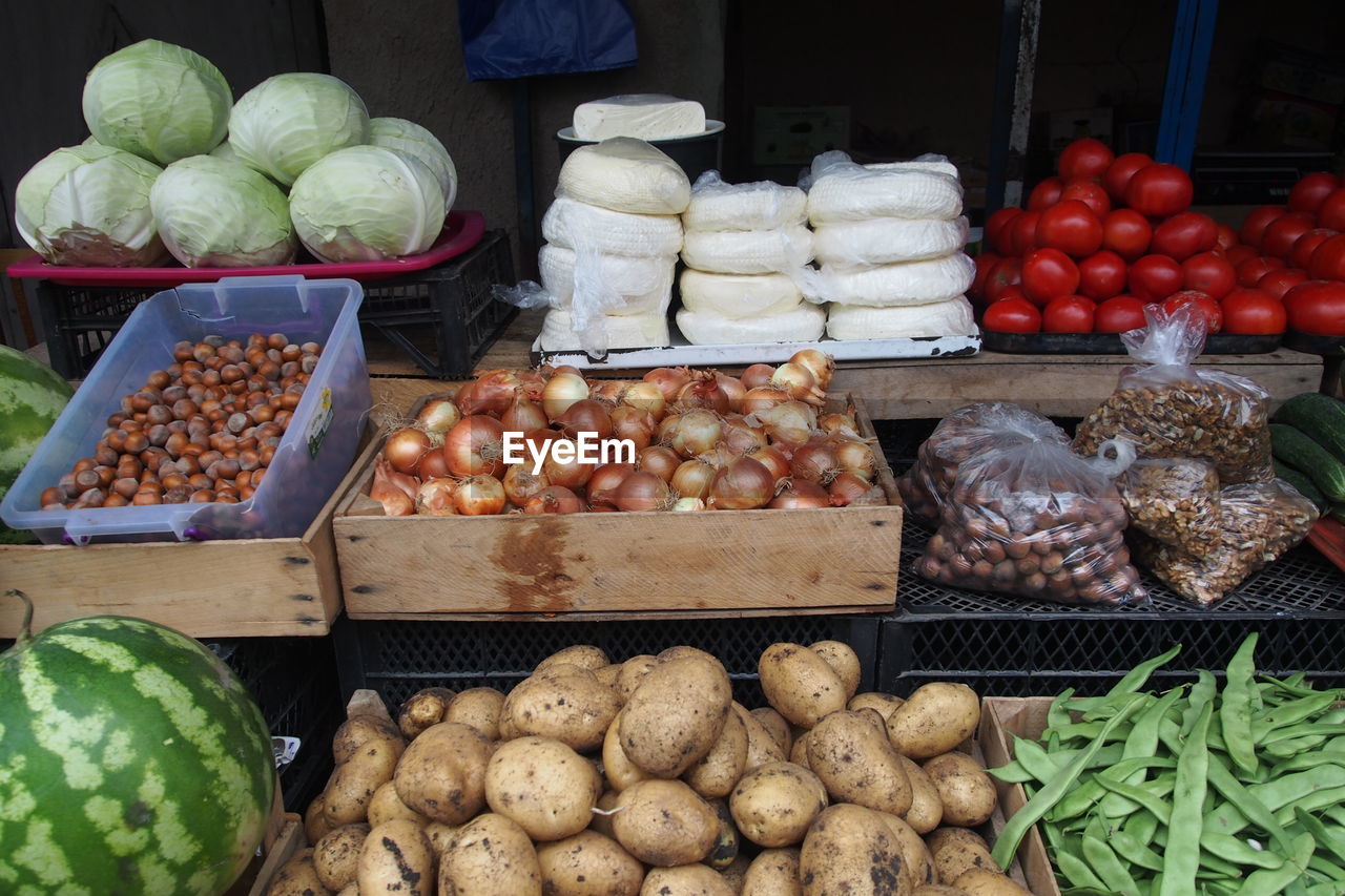 Fruits and vegetables for sale at market stall